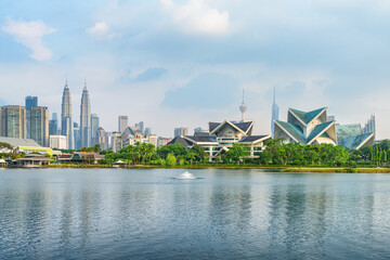 Awesome Kuala Lumpur skyline. Scenic lake and fountains