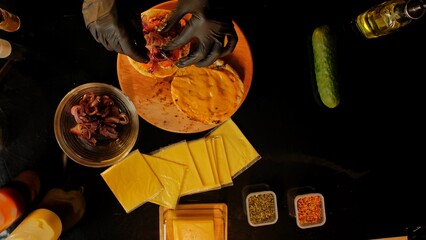 Artisan Burger Preparation with Fresh Ingredients and Cheese