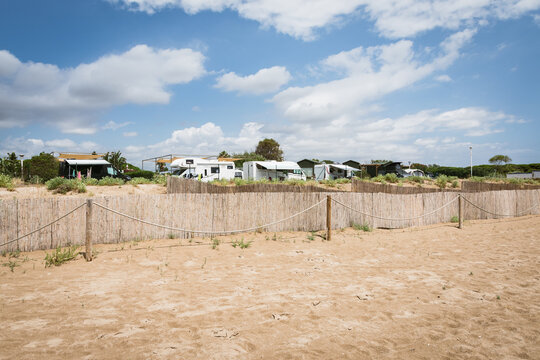 Caravans at the campsite next to the beach in summer