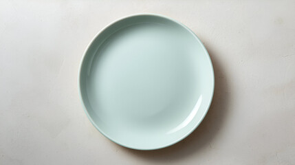 Pastel mint ceramic plate with soft shadows for elegant modern minimalist decorative stylish tableware design
