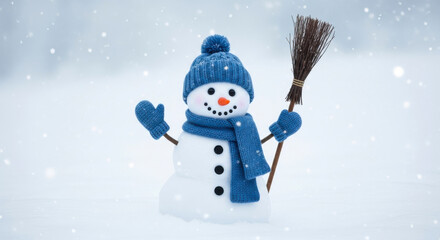 Friendly snowman wearing a blue hat and scarf holding a broom in a snowy winter landscape
