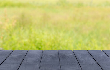 Empty rustic texture table top with blur green natural background. Display mock up, for your product