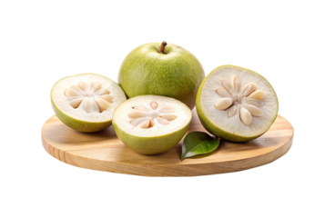 Closeup of Bael Fruit on a Round Wooden Board, a Healthy Exotic Fruit