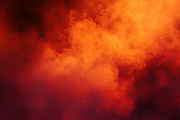 Dramatic abstract background of fiery orange and red smoke clouds.