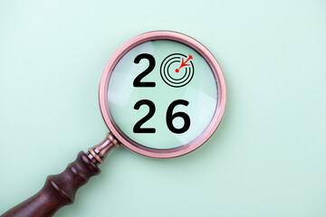 2026 New Year card. New Years goals 2026 with magnifying glass, target icon. Concept 2026 New Year background. Business, resolutions, goals, inspiration, financial, success, ideas
