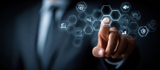 Businessman interacting with a futuristic digital interface displaying technology icons.