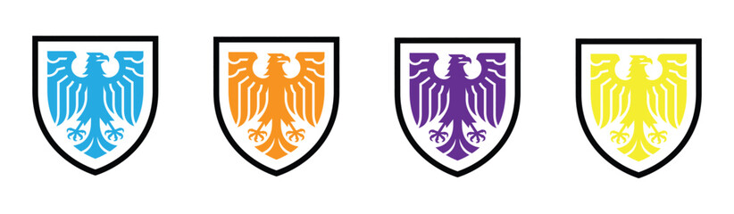 Fototapeta premium Dynamic eagle crests in vibrant blue, orange, purple, and yellow hues showcase strength and heritage for modern branding and design projects.