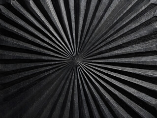 Obraz premium Radiating black starburst pattern with textured etched lines converging at center, creating dramatic abstract background with sense of depth and movement