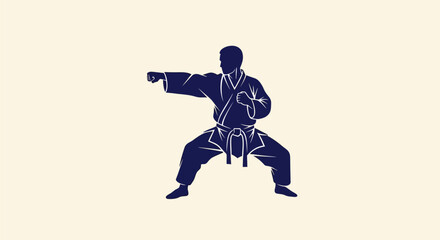 Obraz premium Blue silhouette of a martial artist in a fighting stance.