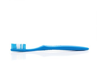 A bright, vibrant blue toothbrush rests on a white background, showcasing its clean, simple design.