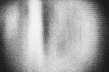 Abstract black and white grunge distressed texture background,texture overlay effects of bad photocopySmudged Scanner,black and white grainy background with dust and scratch,old photo overlay texture