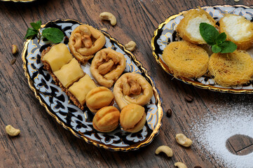 oriental sugary treats in a plate photo on the background