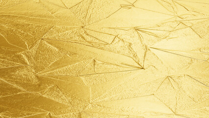 Golden foil texture with shiny metallic surface, abstract luxury background for design and...