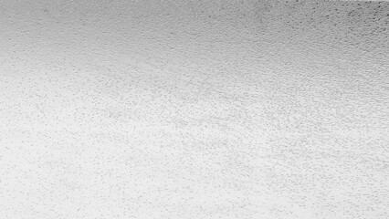 Silver foil texture with shiny metallic surface and wrinkled pattern, abstract luxury background for design and decoration.