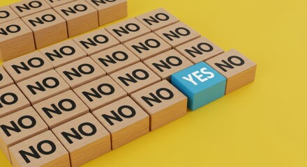 A single blue cube with the word YES stands out amongst many wooden cubes with the word NO