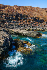 Volcanic landscape near Orchilla lighthouse on the southwest coast of the El Hierro island, Canary Archipelago, Spain, Europe	
