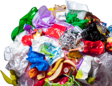 Close up of garbage pile with colorful plastic and food waste. Concept of pollution recycling overconsumption and environmental sustainability issues. Transparent background