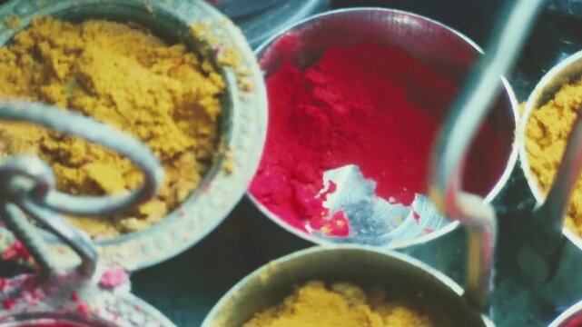 Kumkum applied as bindi on Ajna Chakra by Indian women for beauty, marital bliss, husband's longevity. In Hindu Pooja, Haldi, Kumkum vital offerings, symbolizing purity, divine energy, blessings.
