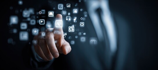 Person touching a futuristic digital interface with glowing icons and data streams.
