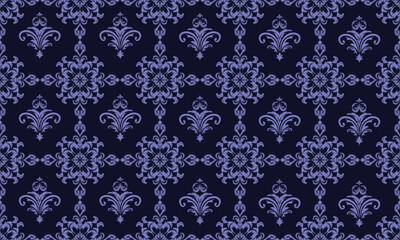 Fototapeta premium This seamless damask vector pattern in purple and blue is perfect for use on fabrics such as upholstery, curtains, bedding, tablecloths, rugs, and fashion textiles, adding luxury to any design.