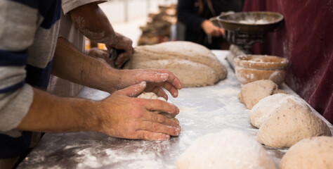 Fototapeta premium process of making bread. dough kneading
