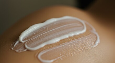 Cream on skin White cream is applied on human skin showing texture and application pattern