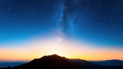 Fototapeta premium Night Sky Vista: Witness the breathtaking expanse of the cosmos, with a serene mountain range set against a majestic night sky, brimming with twinkling stars and the soft glow of the Milky Way.