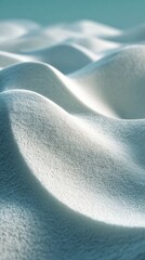 Abstract snow dunes with soft curves in winter light