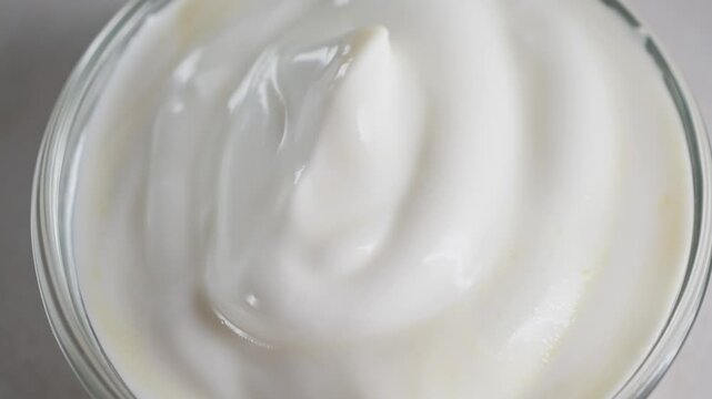 Homemade mayonnaise sauce in bowl close up footage. Sour cream, fresh Greek yogurt. High quality 4k footage