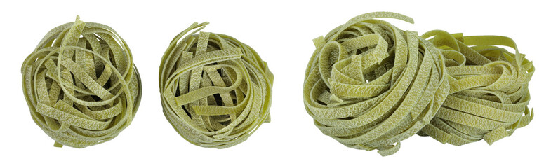 Raw tagliatelle green pasta with spinach isolated on white background. Top view. Flat lay