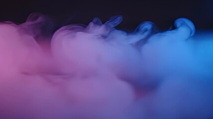 Captivating dance of colorful smoke, mixing purple and blue, perfect for abstract backgrounds - Powered by Adobe