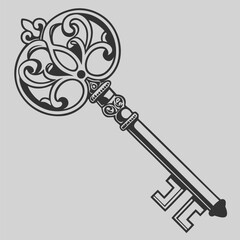 an intricate vintage key with ornate floral design details