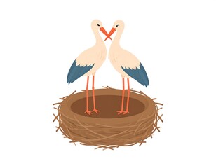 Two storks facing each other in a nest