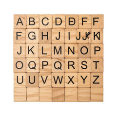 Vintage light brown wooden letter tiles with black A-Z letters and blank tiles, arranged in a grid on a transparent background, top-down, sharp focus. Concept of language education