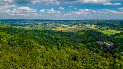 Aerial view of forest with farm land in rural New Jersey 