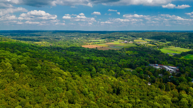 Aerial view of forest with farm land in rural New Jersey 