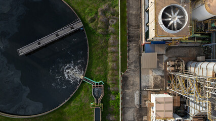 Aerial view wastewater treatment plant, Sustainable water management environment, Black water treatment tank with waste water, Circle circular water clarifier cleaning water.