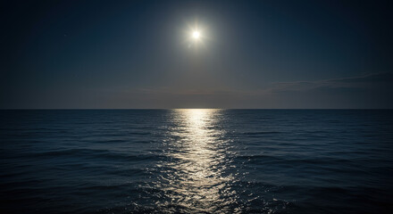 Moonlight reflecting on dark ocean water