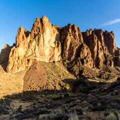 Sunrise over colorful, dramatic rock formations