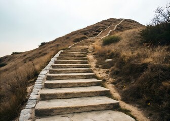 Stone Steps Ascending a Hillside Under a Cloudy Sky