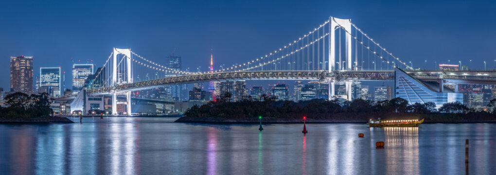 Rainbow Bridge panorama at night, Odaiba, Tokyo, Japan