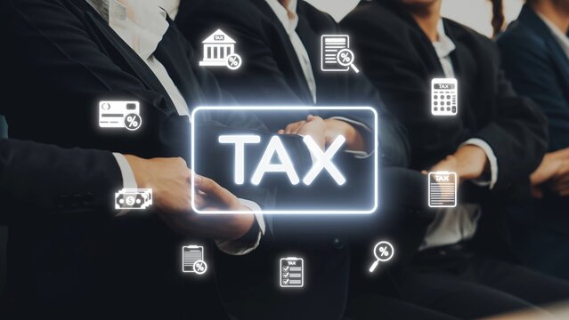 A diverse group of professionals engages in a business meeting focused on taxation, surrounded by various financial icons, emphasizing compliance and strategic discussion. Raster - Powered by Adobe