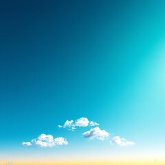 A serene landscape showcasing a clear blue sky with soft clouds drifting across. The perfect backdrop for relaxation and inspiration, evoking a peaceful sense of nature's beauty.