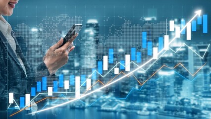 A businesswoman interacts with her smartphone, analyzing financial data graphs against a modern city backdrop, illustrating trends and investment strategies. Copula