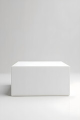 White gift box tied with blue ribbon on clean background