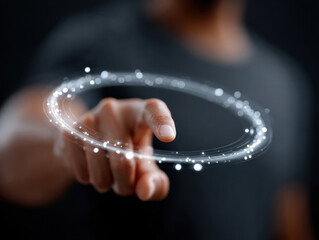 Businessman touching futuristic glowing circular interface on dark background