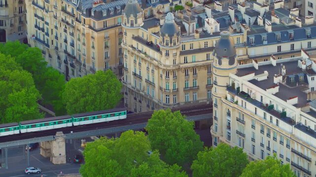 The Paris metro runs along the famous bridge near the Eiffel Tower. The oldest metro line