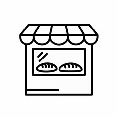 Charming bakery storefront with fresh bread displayed in the window