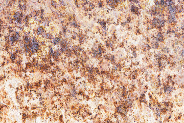 Rusty corroded metal texture background. Old oxidized steel surface with orange brown corrosion spots. Industrial grunge detail. Weathered metallic structure closeup. Rough damaged material surface.