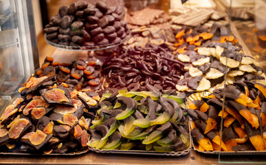 Orange peels with chocolate in a pastry shop